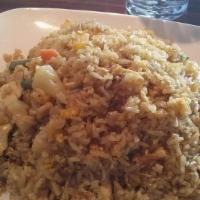 Pineapple Fried Rice · Most popular. Eggs, pineapple, scallions, peas and carrots with curry powder and cashew.