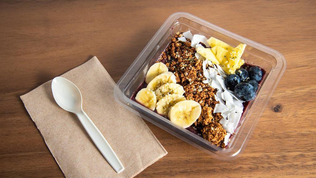 Gi Original Acai Bowl · Blended unsweetened acai and frozen banana with coconut milk. Topped with granola (nut free, gluten free), strawberry and unsweetened coconut flake.