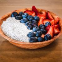 Chia Pudding · Chia Seeds soaked in unsweetened coconut milk, vanilla and agave. Topped with seasonal fruit