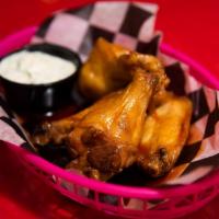 Wings · Jumbo chicken wings tossed in your choice of sauce: bourbon BBQ, classic buffalo, Korean BBQ...