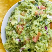 Guacamole & Chips · House-made guac and tortilla chips.