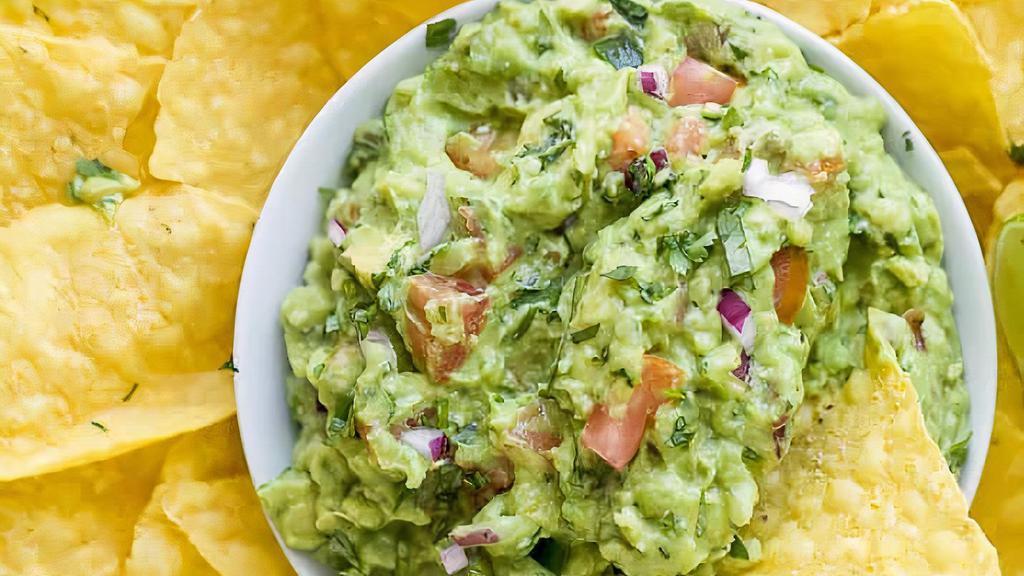 Guacamole & Chips · House-made guac and tortilla chips.
