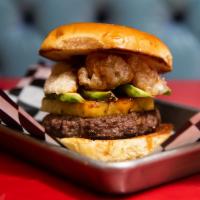 Otto'S Shrunken Head · Avocado, fresh spicy pineapple slices, house-fried pork rinds, and drizzled with Korean BBQ ...
