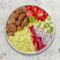 Lamb Of God Rice Bowl · Exotic lamb meat slices topped on bed of rice with side of salad.
