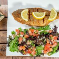 Whole Fish / Fried Fish · Well fried Tilapia medium-sized fish / lemon on the side served with house salad.