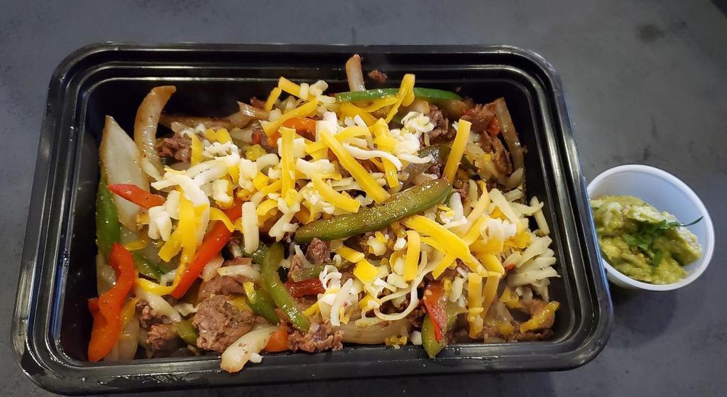 Steak Fajitas · Sliced flank steak, grilled green peppers, red bell peppers and onions, soft corn tortillas, cheddar cheese, and guacamole. CANNOT REMOVE ONIONS