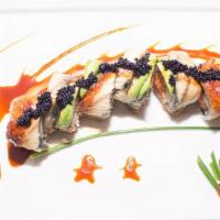 Black Dragon Roll · Spicy crunch tuna, cucumber topped with eel, avocado served with eel sauce, black tobiko.
