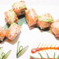 Bonita Roll · Spicy crunchy scallop, mango inside, topped with seared salmon, avocado served with sweet ch...
