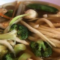 Udon Soup  With Vegetable · Japanese thick noodles with assorted vegetables.