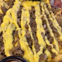 Cheesesteak Fries* · Our famous cheesesteak tossed over a large order of fries.