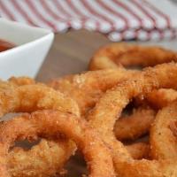 Onion Rings · Battered and fried till crispy golden brown (12pcs)