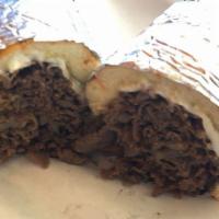 Steak And Cheese Sandwich · Tender slices of steak covered with melted italian provolone or american cheese, smothered w...