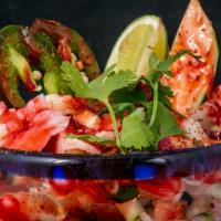 Ceviche · Shrimp cured in lime juice, cucumber radish pico de gallo served with tortilla chips.