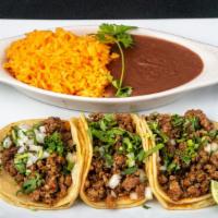 Street Taco Platter · 3 tacos - choice of sirloin steak, chicken, chorizo, chicharron or veggie served with refrie...