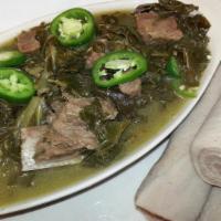 Gomen Besiga · Collard green and beef cubes cooked with onion and Ethiopian spices