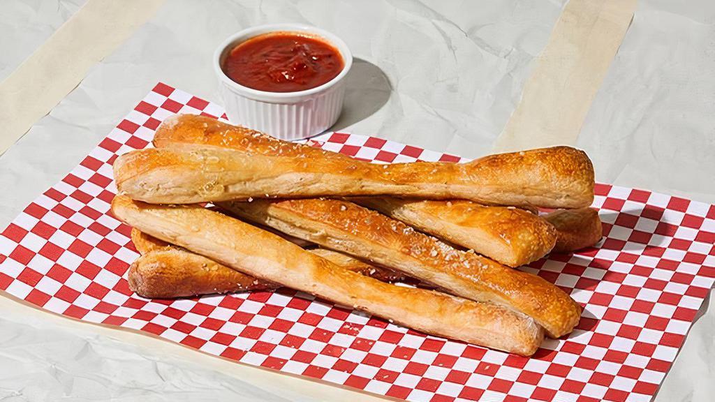 Bread Sticks · 2 pieces baked bread sticks with side of marinara sauce.