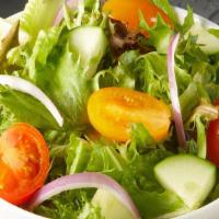 Mixed Green Salad · Mixed greens tossed with red onion, tomato, cucumbers & served with Italian dressing.