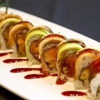 Dragon Roll · Raw. Sweet potato tempura wrapped with eel, avocado, and eel sauce.