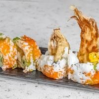 Spider Roll · Raw. Soft shell crab tempura with avocado, cucumber, tobiko, and spicy mayo.