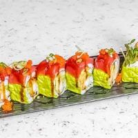 Sumo Roll · Raw. Shrimp tempura, seafood salad, tobiko, eel sauce, sriracha, avocado, wrapped w/ tuna & ...