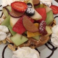Belgian Waffle · Served with fresh fruits of the season and whipped cream.