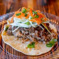 Oxtail Pulled Beef Taco · Rice, pulled oxtail, angry mayo, pickled slaw, cilantro