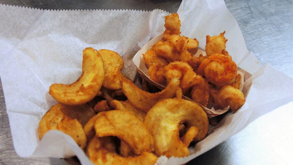 Shrimp Basket · Eight lightly fried shrimp with fries. Add your choice of house-made sauces for 50 cents; 25 cents for all other sauces.