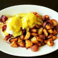 Bacon Benedict · English muffin topped with grilled bacon, two poached eggs and hollandaise sauce.
