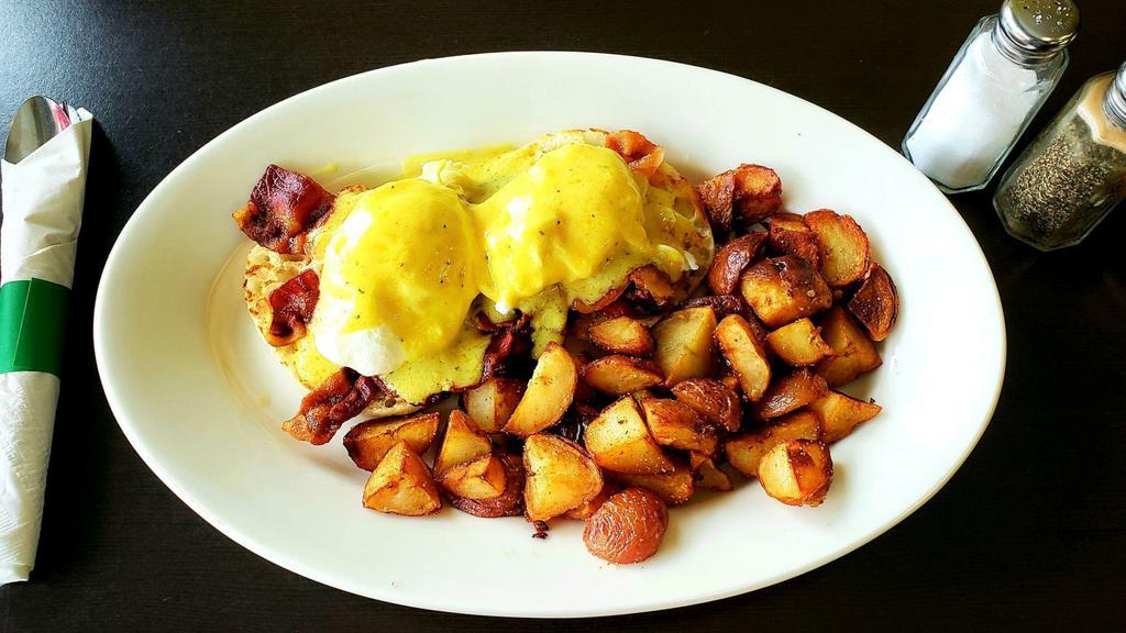 Bacon Benedict · English muffin topped with grilled bacon, two poached eggs and hollandaise sauce.
