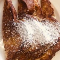 Ultimate Cinnamon Swirl French Toast · Made from fresh baked cinnamon bread, this is the best french toast you will ever eat!.