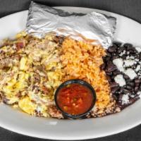 Carnitas Con Huevos · Shredded pulled pork mixed with scrambled eggs, served with rice, beans and tortillas instea...