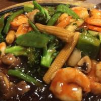 Shrimp Teriyaki · Steamed shrimps sauteed with vegetables in teriyaki sauce, served on a hot sizzling pan. Ser...
