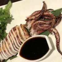 Grilled Jumbo Squid · Whole jumbo squid grilled with teriyaki sauce.
