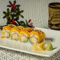 Seared Mango Roll · Spicy blue crab and cucumber inside, shrimp, mango, sesame seeds and shichimi on top, with J...