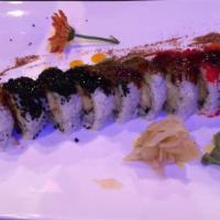Bomo Lobster Roll · Lobster tail tempura with crab stick inside topped with rainbow tobiko.
