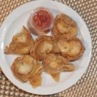 Crab Rangoon · Cream cheese mixed with shredded crab meat, served with sweet homemade sauce.