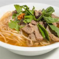 Beef Noodle Soup · Scallions and bean sprouts in clear broth.