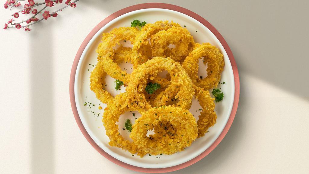 Onion Of The Rings · (Vegetarian) Sliced onions dipped in a light batter and fried until crispy and golden brown.