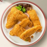 Terrific Tenders · Chicken tenders breaded and fried until golden brown. Served with your choice of dipping sau...