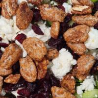 The Crazy Goat Salad · Candied pecans and goat cheese atop a fresh garden salad with craisins and our house vinaigr...