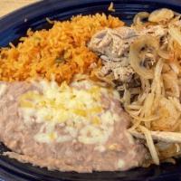 Carnitas · Tender chunks of roasted pork and grilled onions served with Mexican rice, refried beans, gu...