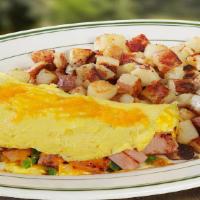 Lumberjack Omlette Combo · 3-egg omelet with ham, sausage, spinach, mushrooms, cheddar, and home fries