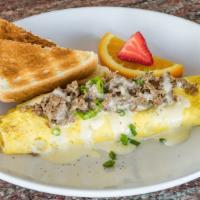 Cheesesteak Omelette · Shaved rib-eye, fried onions, American cheese.  Served with homefries and choice of toast.