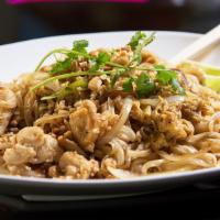 Pad Thai · Stir-fried Thai rice noodle with egg, onion, bean sprouts and peanut.