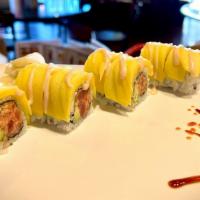 Mango Roll · Spicy tuna, avocado and crunchy with mango on top. Consuming raw or undercooked meats, poult...