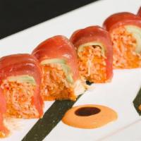 Angel Roll · Sliced tuna roll around spicy crab meat and avocado. Consuming raw or undercooked meats, pou...