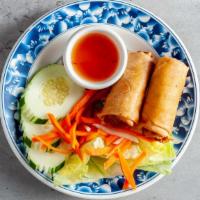 Egg Roll · Cha gio. Pork, mushroom, onion, bean thread noodles rolled in rice paper, and deep-fried to ...