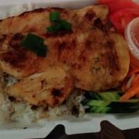 White Rice With Grilled Chicken · Com ga nuong. Served with salad and sweet sauce.