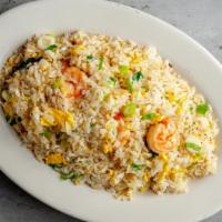 Fried Rice With Shrimp · Com chien tom. Fried with egg, bean sprout, onion, and scallion.