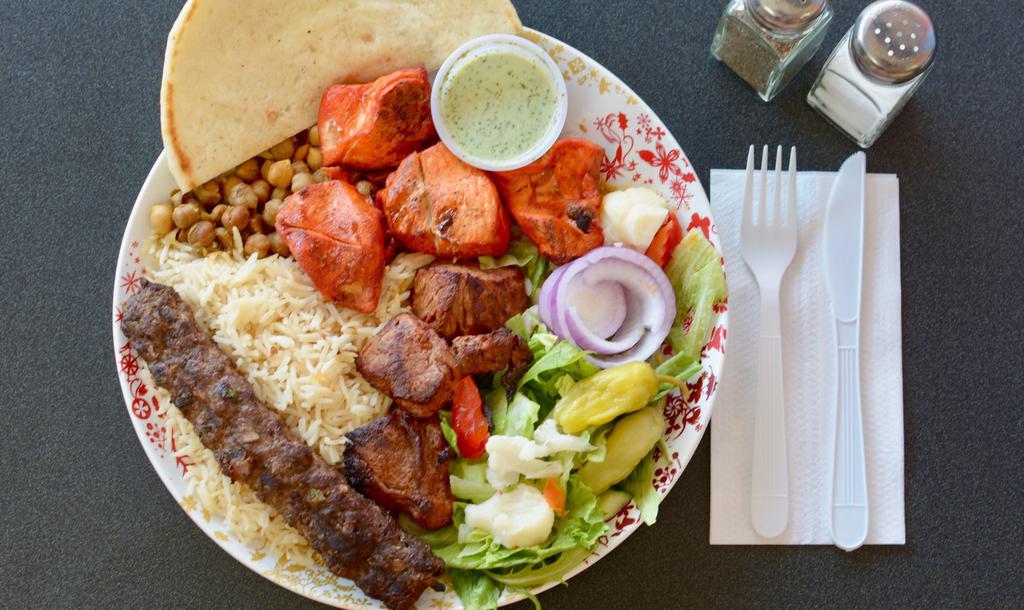 Combo 3 Lamb, Chicken And Beef Kabob · Made with fresh homemade sauce and fresh marinated meat, comes with lettuce tomato and onion.
